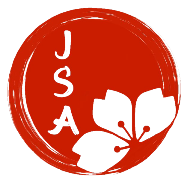 small JSA logo with white flower and red background